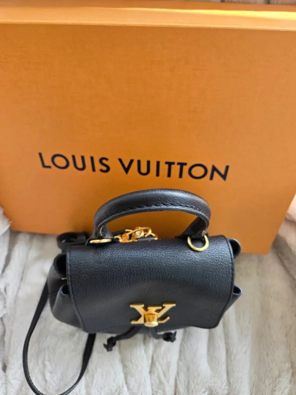 Louis Vuitton Lock Me Mini Backpack
